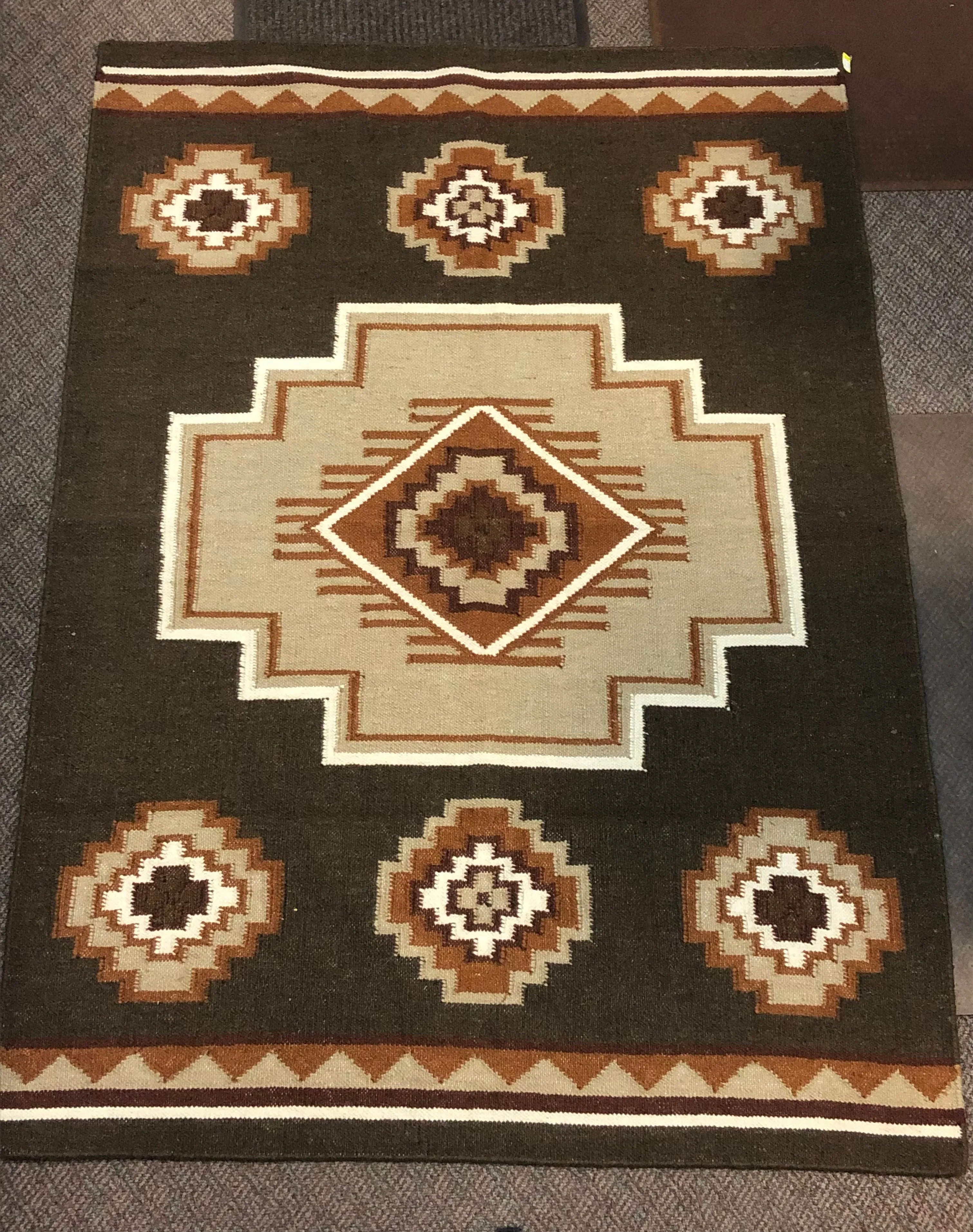 Handwoven wool rug.  Original design in 5 sizes. 29277