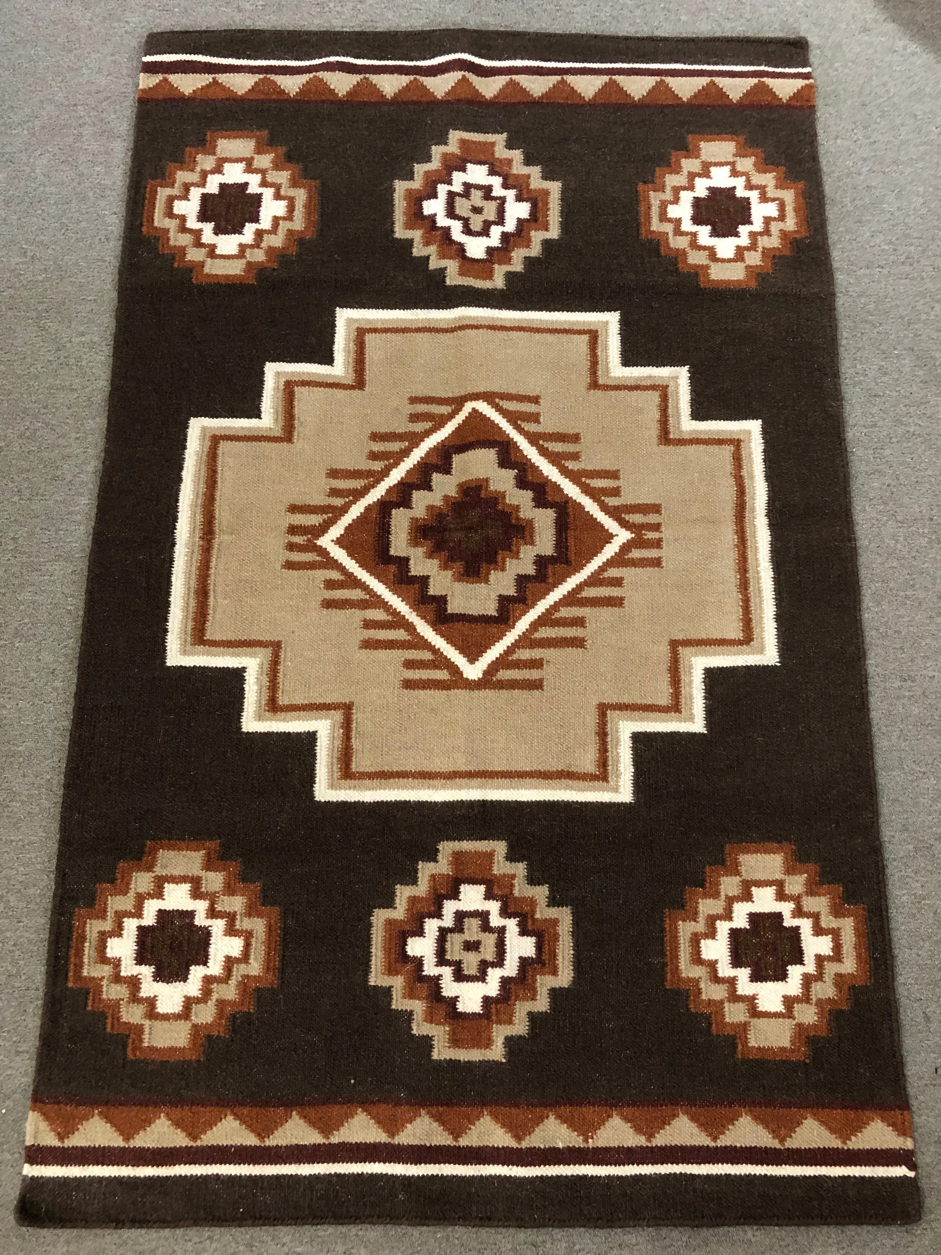 Handwoven wool rug.  Original design in 5 sizes. 29277